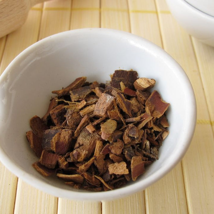 Cascara sagrada bark in white bowl - natural herbal colon support ingredient used by SpeedyVite