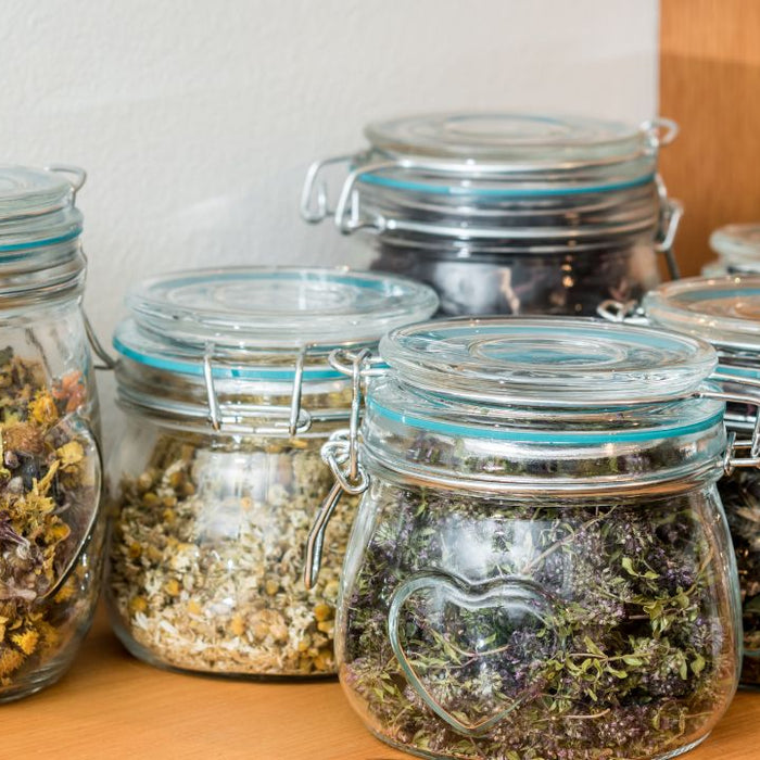 Multiple herbal detox teas lined up showing a cleanse sequence