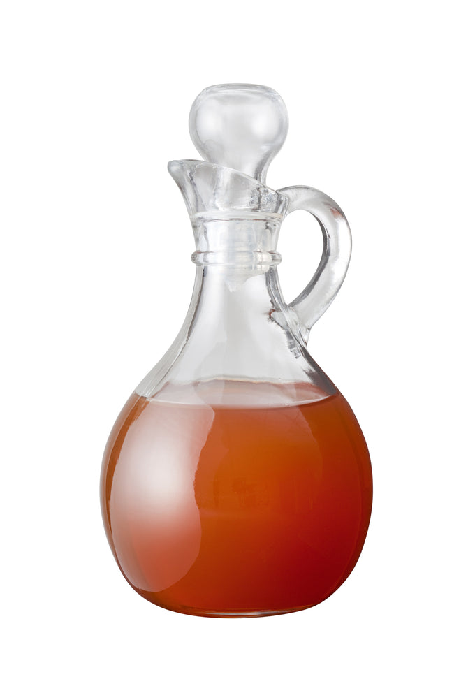 Apple cider vinegar with apples