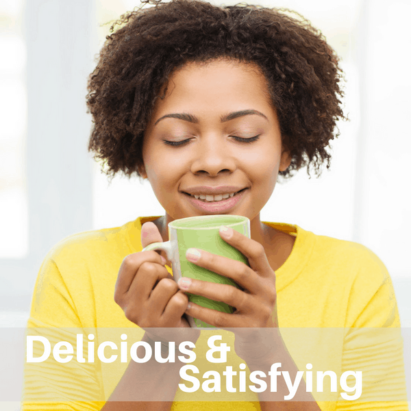 Person enjoying a warm cup of Liver LifeBoost® herbal tea