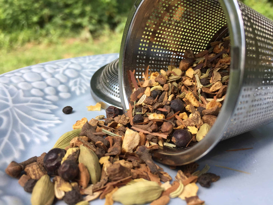 Liver LifeBoost® loose-leaf herbal blend in fine mesh infuser